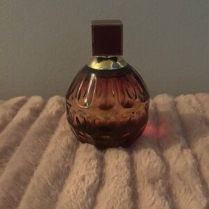 Jimmy Choo Fever Perfume with Gold and Deep Red Accents